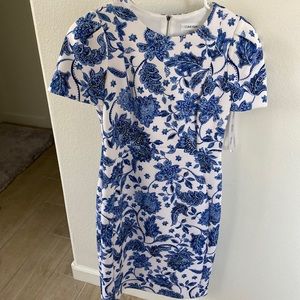 Beautiful white and blue Calvin Klein dress never worn… Size 6..